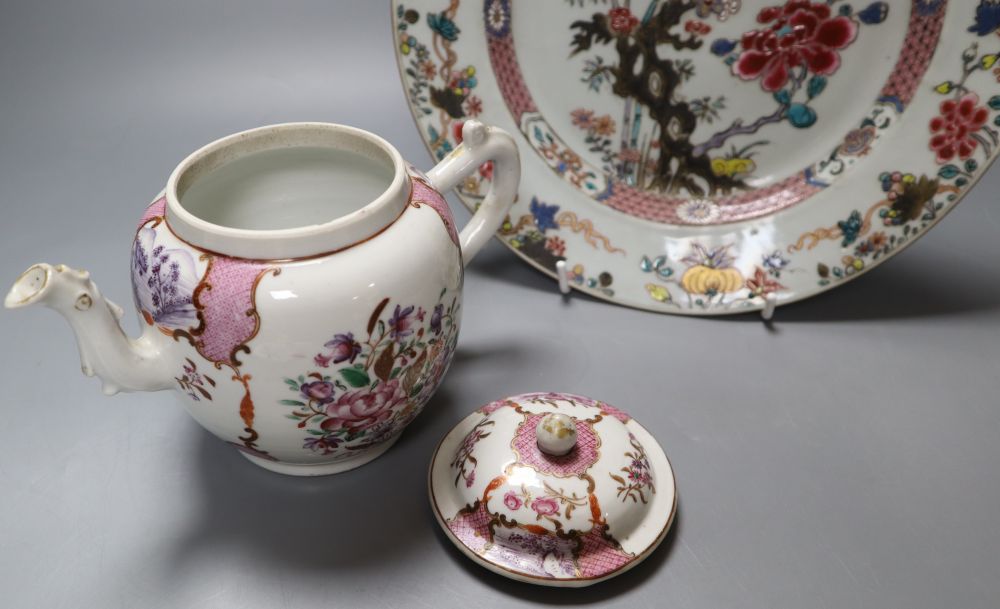 A 18th century Chinese famille rose export plate and an 18th century export teapot, cover and stand (the latter repaired)